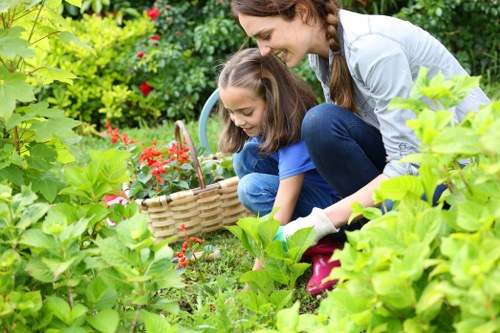 Community volunteers sorting plants and materials for charity reuse